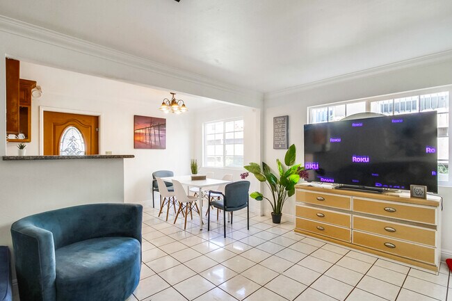 You'll love watching endless shows on our TV, all thanks to the free and fast WiFi - 2304 E 14th St