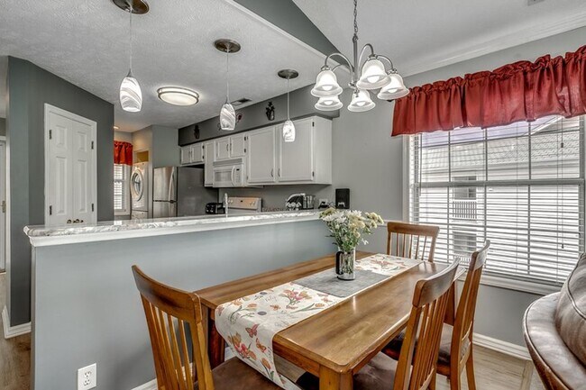 Building Photo - Lovely, Furnished Two- Bedroom, Two-Bath Condo in River Oaks Available Soon!