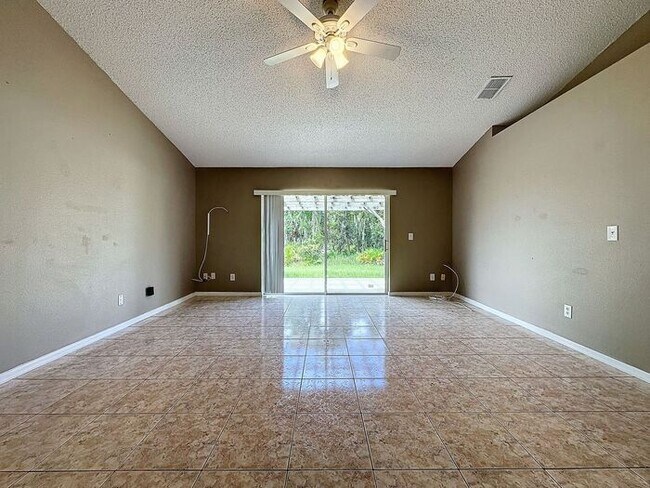 Building Photo - Poinciana single family home in Village 7,...