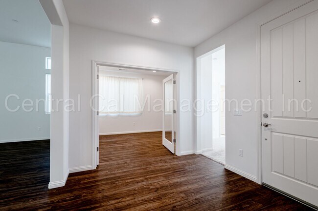 Building Photo - 4 Bedroom/3 Bath Home with Office and Paid Solar - $3395 Per Month!