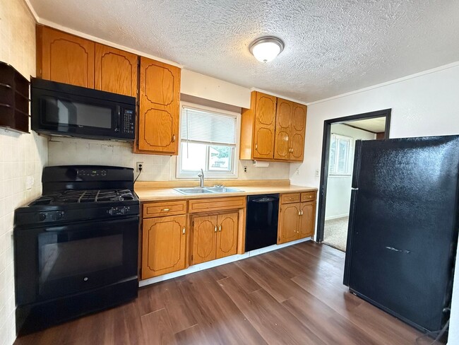 Building Photo - Cozy Main-Floor Living with Garage & Yard