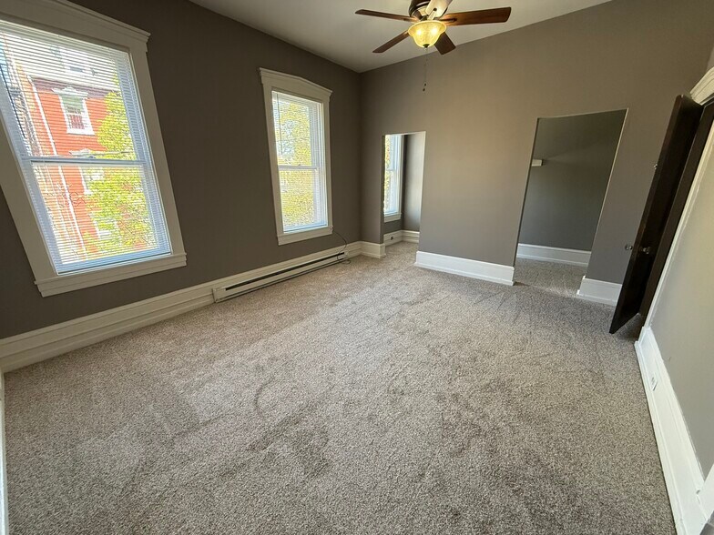 Bedroom 1 with double walk-in closets - 218 E Orange St