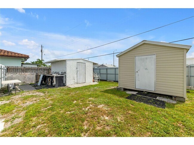Building Photo - 6049 W 14th Ln