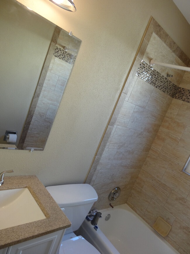 Building Photo - Three Bedrooms One Bathroom with Shaded Porch