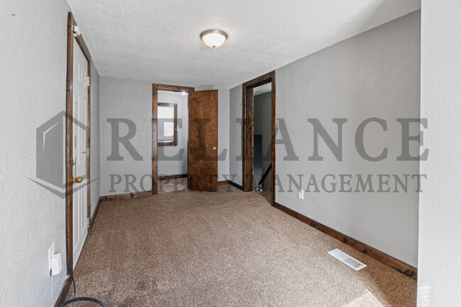 Building Photo - 1735 S Dodge Ave