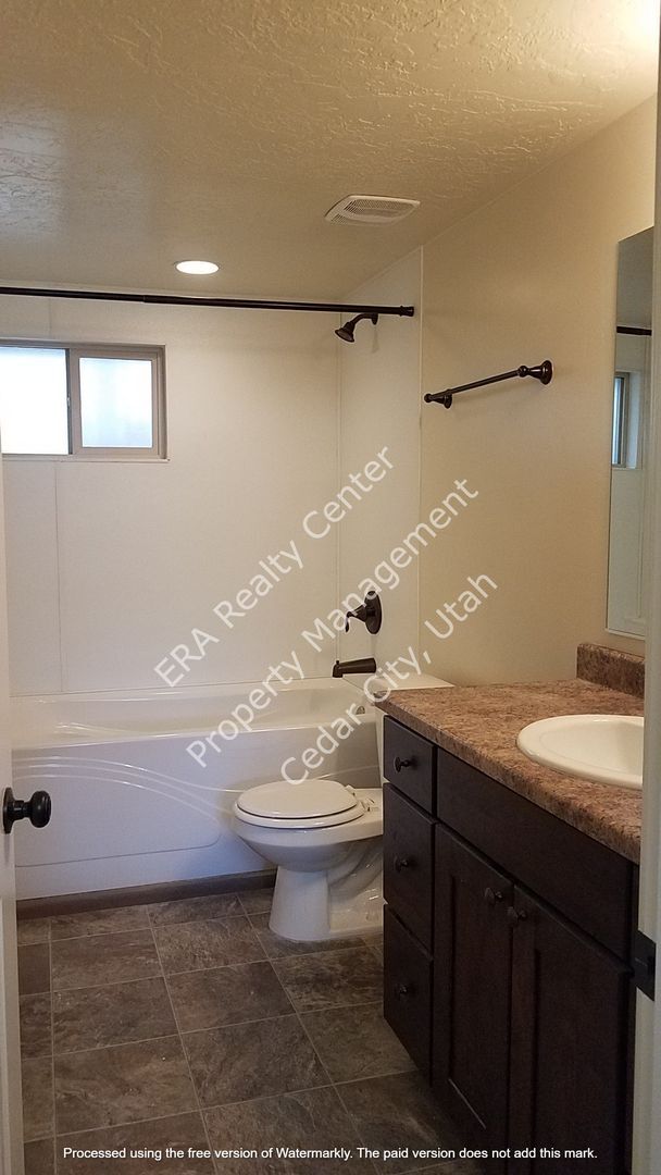 Building Photo - Move-In Discount - 2 Bedroom 1 Bath Basement Apartment of Single Family Home
