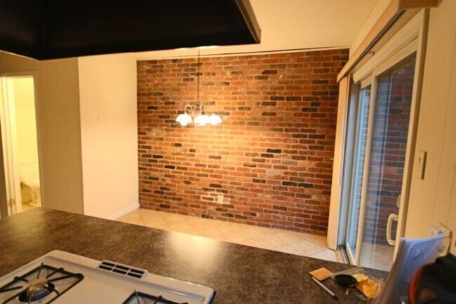 Building Photo - Apply Today! 2 Bedroom - 1.5 Bath condo with garage - heat and hot water included