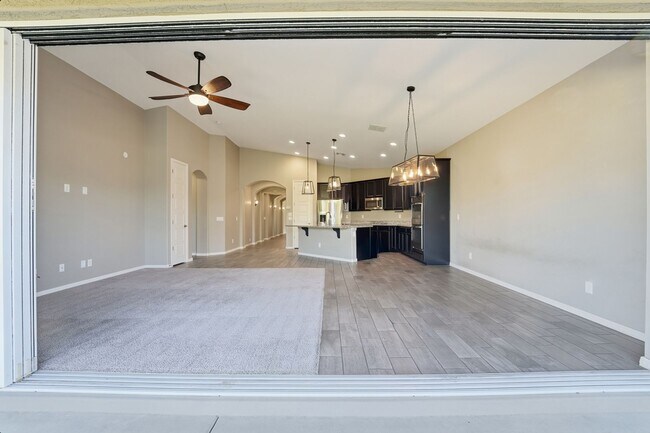 Building Photo - Stunning 4-Bed + Den Eastmark Home with Modern Upgrades Throughout