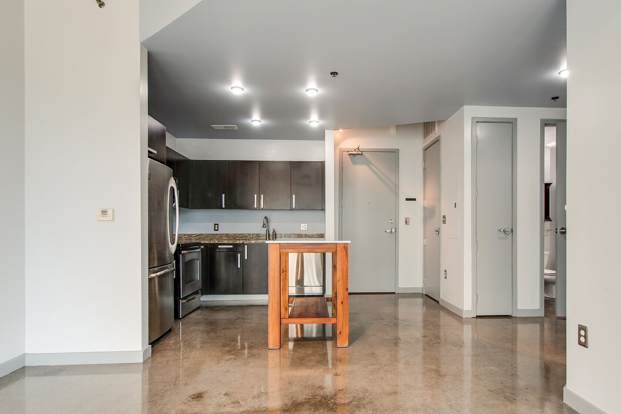 Kirchen view to entrance door - 600 12th Ave S