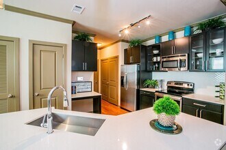 Building Photo - Save Up to $700 – Move-In Special!