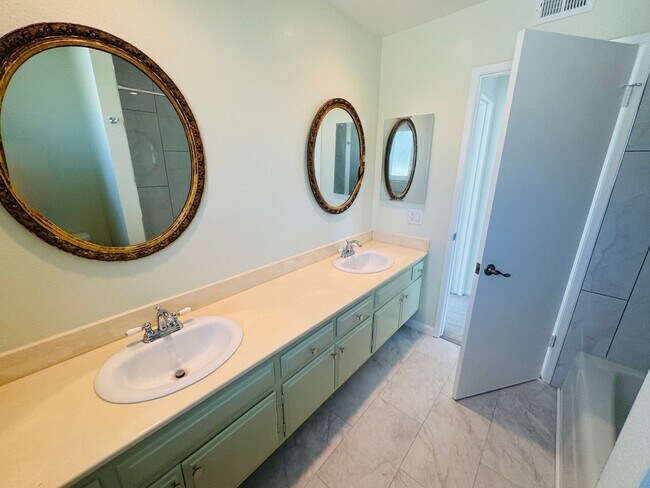 Building Photo - Ideal Multigenerational Home with Separate Downstairs Bedroom and Bath