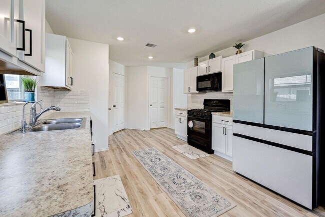 Building Photo - Welcome to this charming two-story home featuring 4-bedroom 2.5-bathroom, located on a peaceful C...