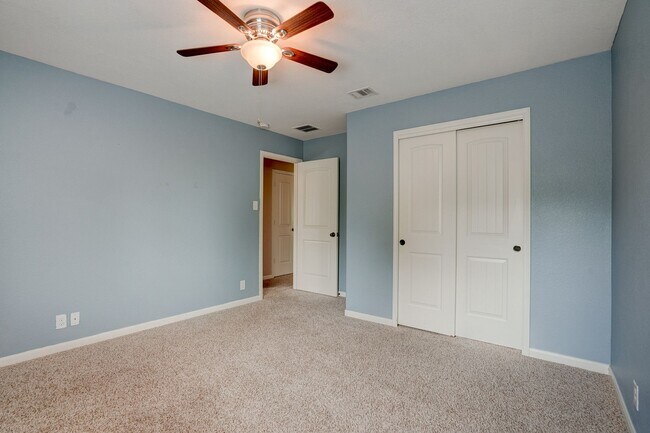 Building Photo - Bright & Roomy 4BR • 2.5BA • Two-Level Living