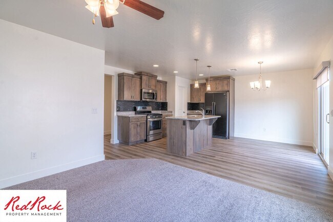 Building Photo - Adorable Stand Alone 4 Bedroom Corner Unit with Fully Fenced Backyard. Small Dogs Welcome.