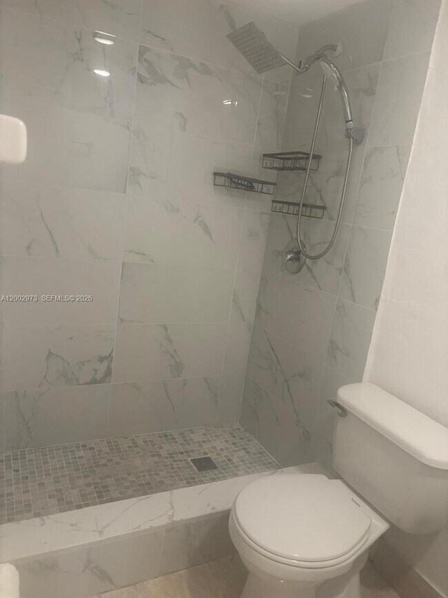 Building Photo - 6950 W 6th Ave