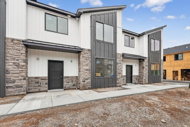 Building Photo - $500 off first month - BRAND NEW 3 BED 2.5 BATH TOWNHOMES WITH 2 CAR GARAGE