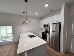 Building Photo - Beautiful Brand New Three Bedroom Apartment!