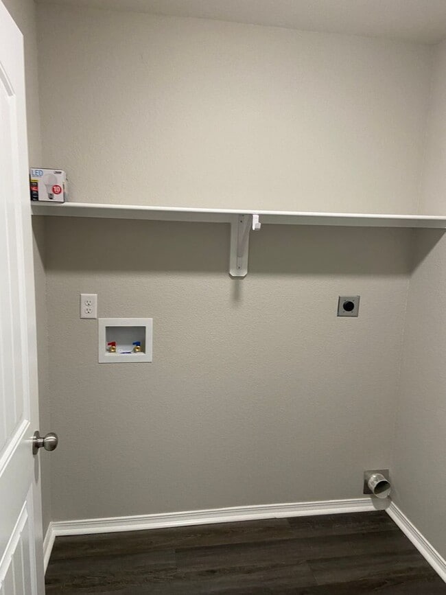 Building Photo - NOW AVAILABLE — Spacious Living in This 4-Bedroom | 2-Bath Conrad Court Home