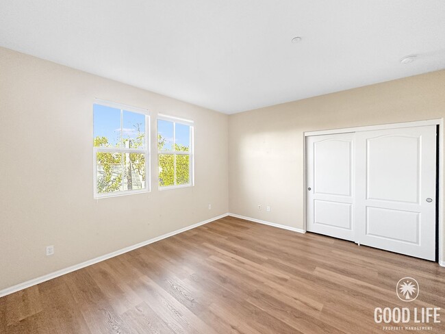 Building Photo - Modern 3-Story Townhome in Bay Park – 3BR/3.5BA with Pool, Balcony & In-Unit Laundry