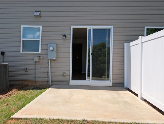 Building Photo - Elegant, Move In ready townhome located in...