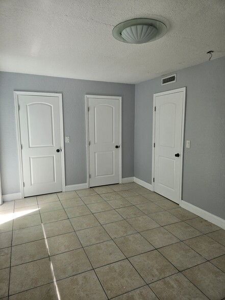Master Bedroom doors to bathroom and Walk in Closet - 309 Avanda Ct