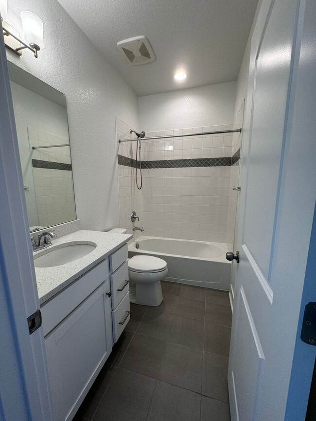 share bathroom upstairs - 21622 E 60th Ave