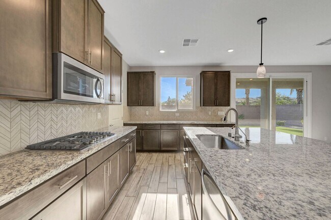 Building Photo - Gated community Located within the Valley Vista Master Plan. 4 Bed 3 Bath features and Open and i...
