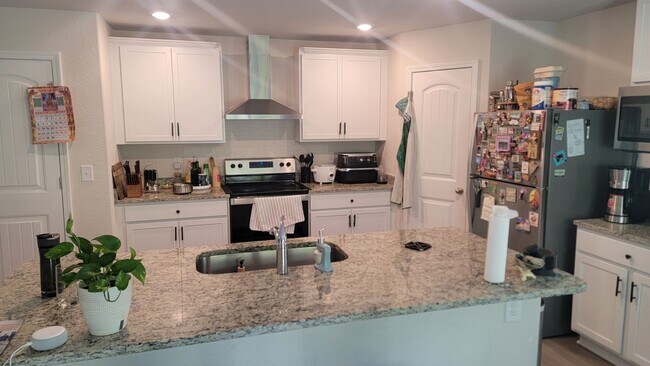 Building Photo - Located in Creedmore Hills a 4BR/2.5BA home with 2 car garage