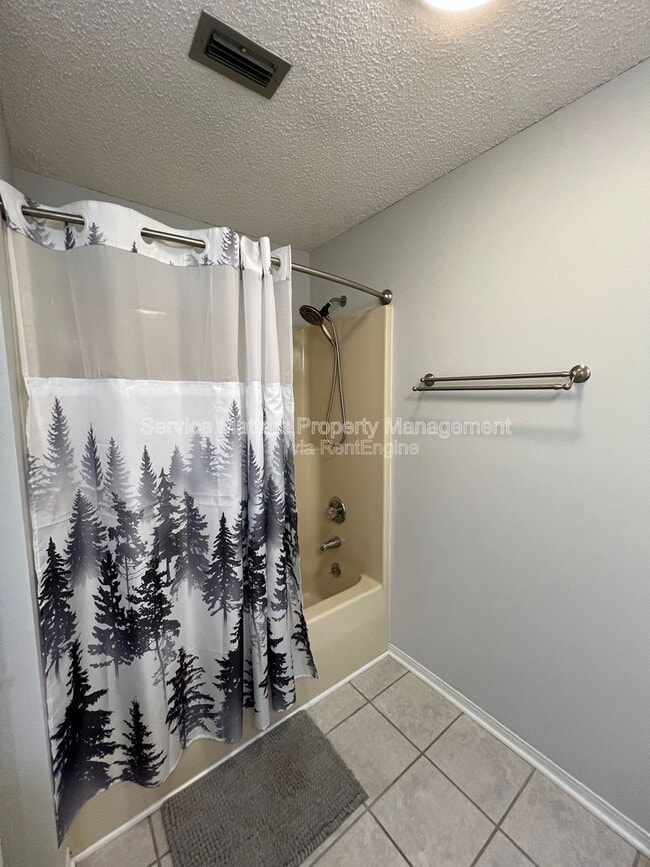 Building Photo - 6004 Players Pl