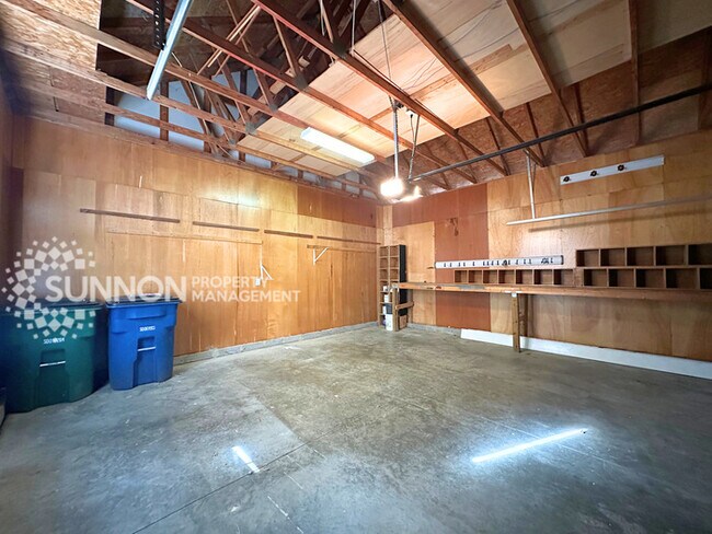 Building Photo - Wooded, Charming 3 Bedroom with Tons of Space