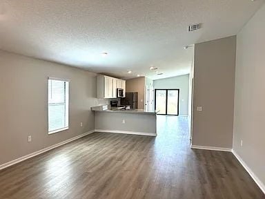 Building Photo - This almost new home is in the beautiful Crossings at Palm River Neighborhood, 5 minutes from 618...