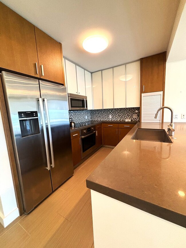 Primary Photo - Luxurious 2 Bedroom, 2 Bath Condo with Stu...