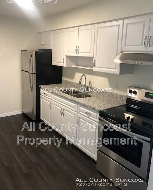 Building Photo - 6277-A 72nd Ave N