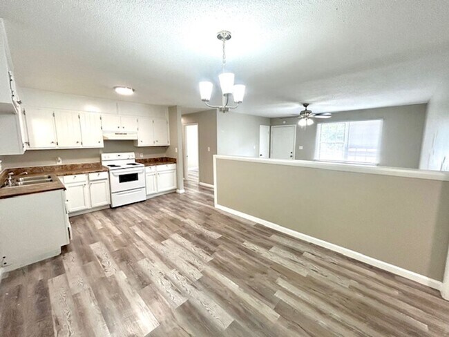 Building Photo - Spacious 4-Bedroom, 2-Bath Home Located in...