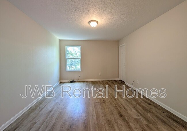 Building Photo - 7820 Playschool Ln