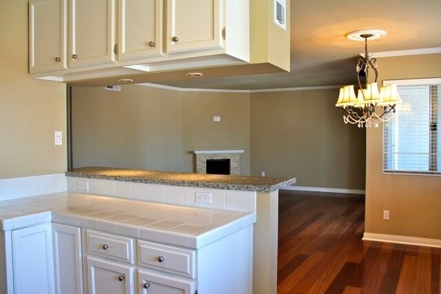 Building Photo - COMING SOON - 3 bed, 2 bath Townhouse with attached 2 car garage ready to move in!!