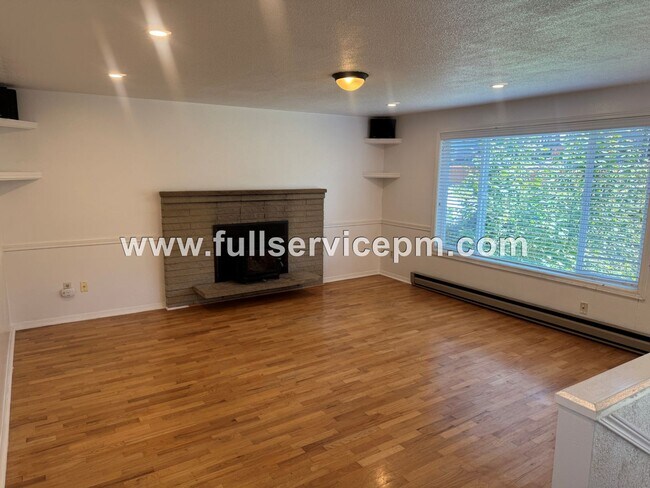 Building Photo - Spacious 4-Bedroom Upper-Level Home with Fireplace, Bonus Room & Large Deck