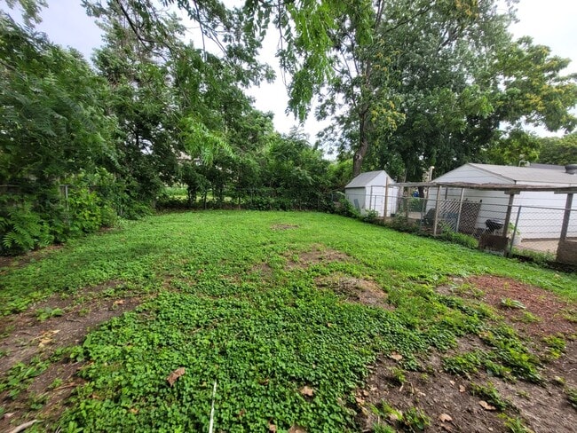 Building Photo - Two bedroom home with partially fenced yard!