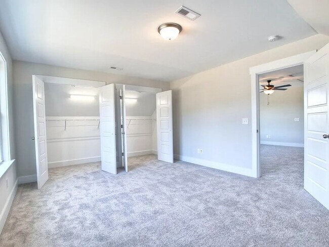 Building Photo - Situated on over 3 acres right in a growin...