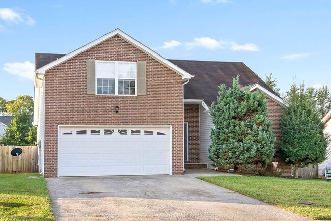 Building Photo - Pet Friendly Three Bedroom with Bonus!