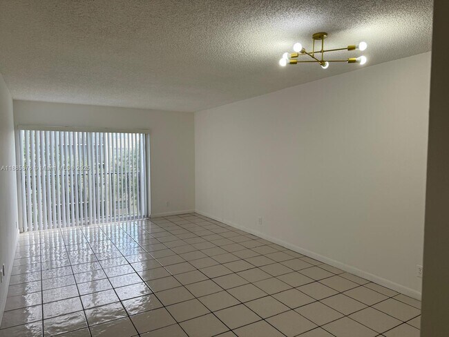 Building Photo - 8550 N Sherman Cir