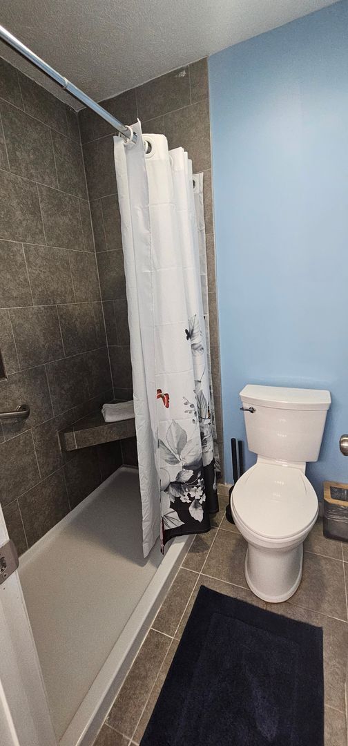 Building Photo - -First-Floor End-Unit | Fully Furnished 2B...