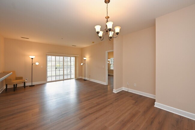 Building Photo - **PRISTINE GARDEN-LEVEL CONDO ON THE FIRST LEVEL NEAR PAVILION AND COMMUNITY GREEN SPACE**