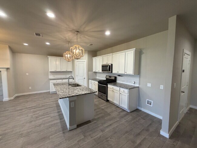 Building Photo - * MOVE IN SPECIAL * Beautiful 4 Bedroom 2 Bath Home in Wollforth Near a Beautiful Park!
