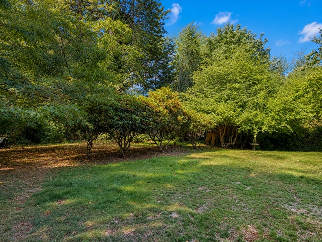 Building Photo - Beautiful Split-Level Home with Fireplace, Deck, Garage, and EV Charger