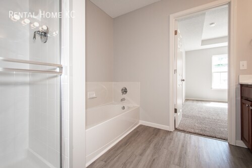 Building Photo - 2-bed, 2.5-bath 2-story Townhouse w/Finish...