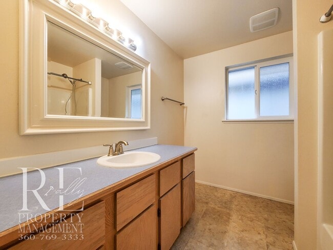 Building Photo - Modernized Two-Story with Open Layout, Gas Fireplace & Large Fenced Yard