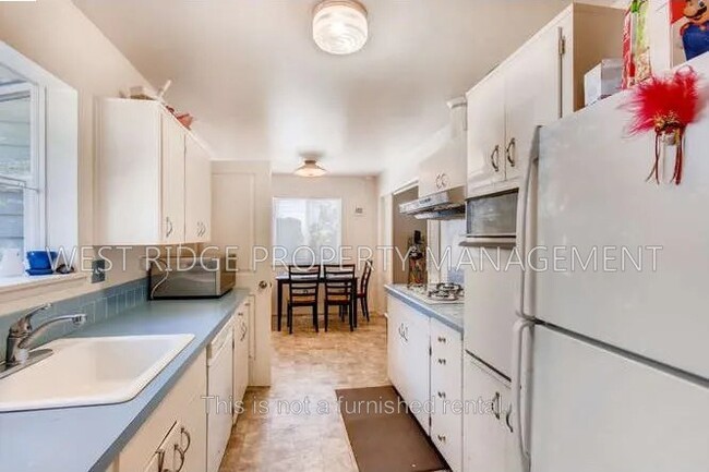 Building Photo - 13980 SW Domino St