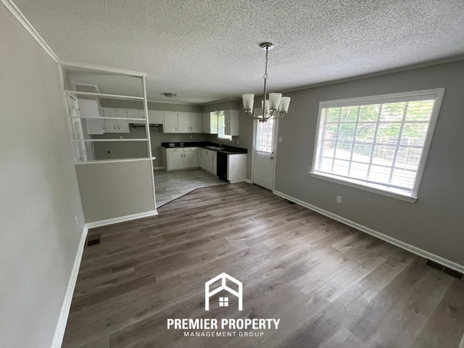 Building Photo - Spacious 4BR/2BA Home in 38118 | Hardwood Floors & Large Fenced Backyard