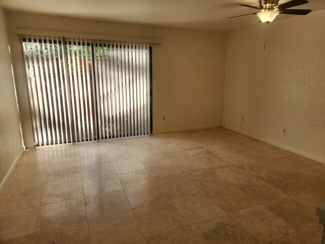 Building Photo - A Must See! Nice and bright, lots of light, two story condo in a well maintained complex.